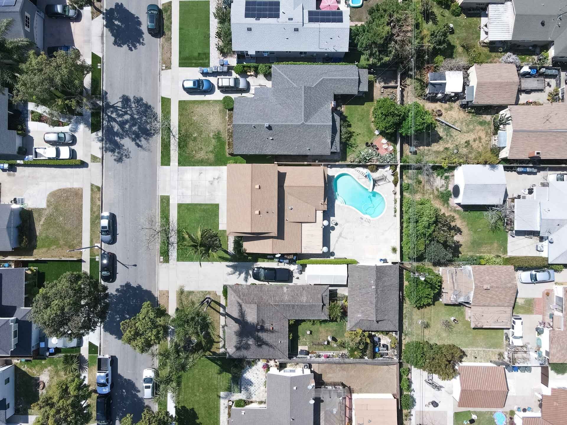 overhead view of suburban neighborhood on a sunny day