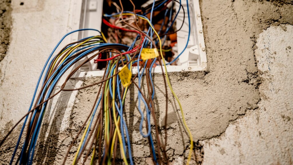 An overloaded electrical panel in San Diego that could cause a fire. Trusted House Buyers will buy property in any condition.