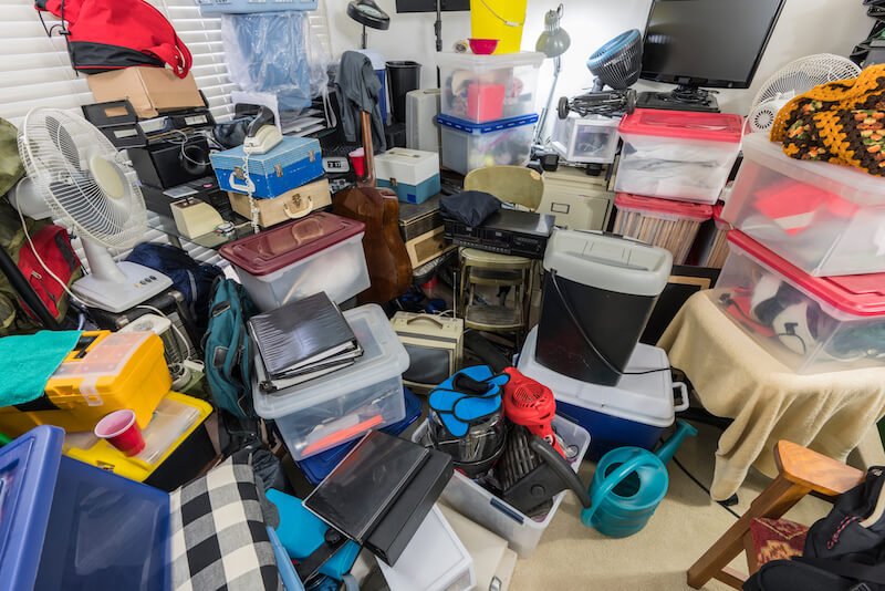 a pile of different stuff at a hoarders house in Memphis