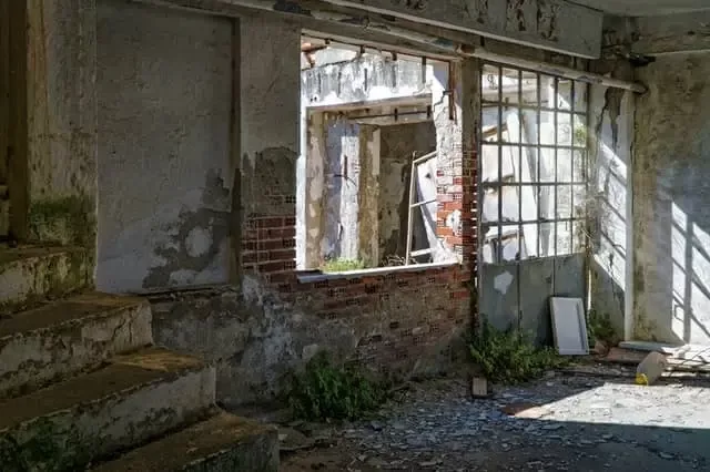 White concrete building in disrepair