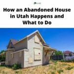 An abandoned house in Utah with boarded up windows and brown grass