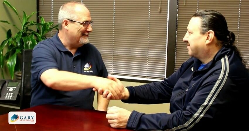 Gary shaking hands with his client