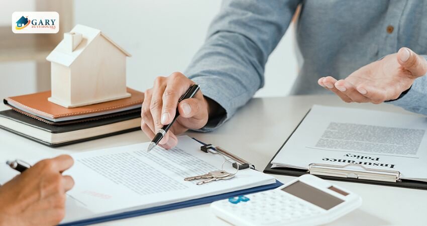 Unknown man at the table discussing something with client while papers in between them