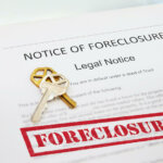 Notice of Foreclosure document and house key