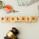 Probate sign, stack of papers and gavel