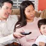 Disadvantages of Buying a Home via Owner Financing | family watching tv