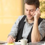 what to look for in hard money lenders in | man on cellphone