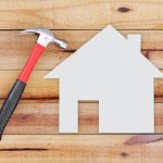 hammer and a house-shaped cut out