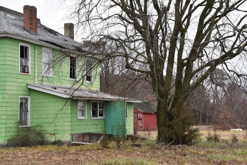 A house in bad condition that has been condemned is put on sale.