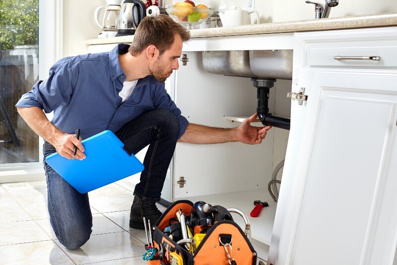 Broken pipes are being repaired in a house in Oshkosh, WI.