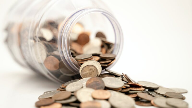 The Pre-Approval Process - coins saving up money for a house