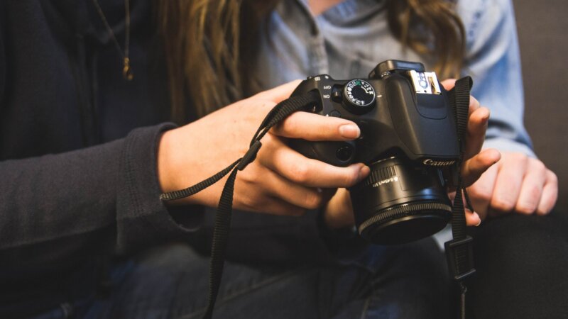 5 Ways To Get Great Listing Photos of Your Greater Cincinnati Area or Northern Kentucky House - person holding camera