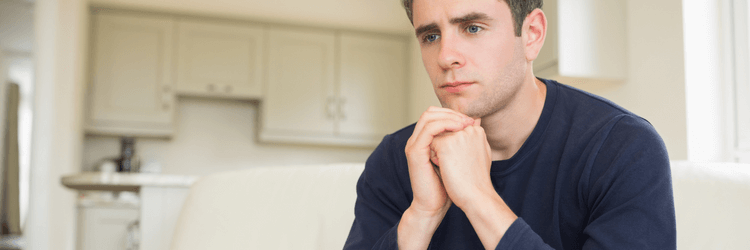 A young homeowner thinking about the different ways to sell his house for a fraction of the time