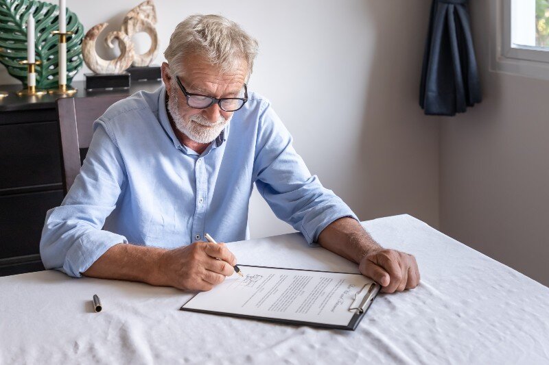 An elderly man lists his home in a will and testament in Knoxville, TN.