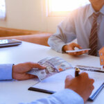 home investor and seller closing deal without closing costs