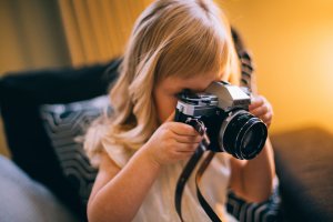 Photo by Daria Shevtsova from Pexels Girl Holding Camera