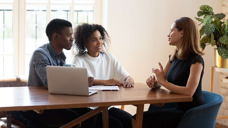 A young couple discussing the tax exemptions in the St. Louis Park area