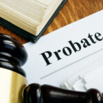 Probate sign, stack of papers and gavel