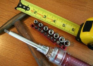 Option to repair damaged house before selling it in Tucson