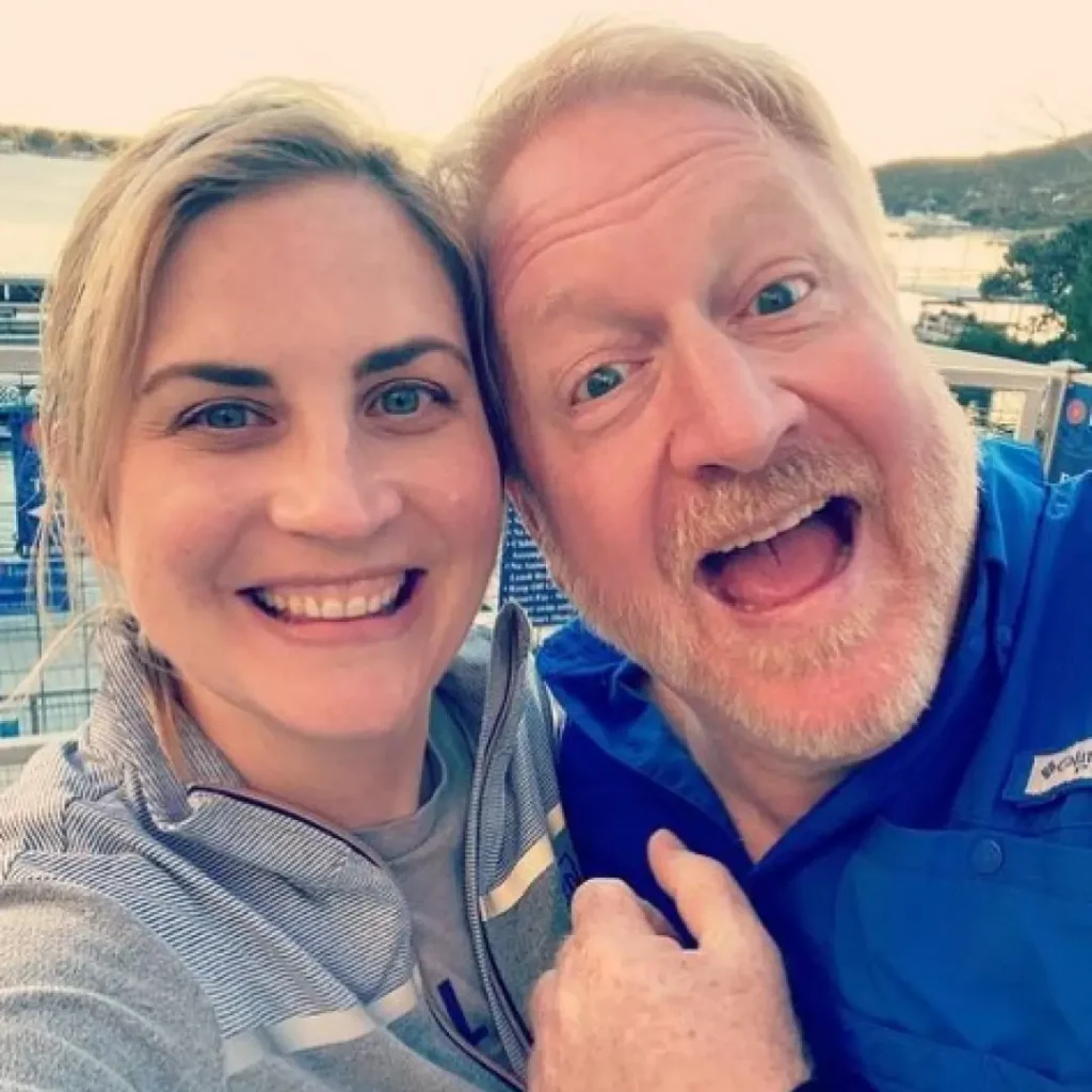 cash house buyer program in North Richland Hills, Texas We buy houses team—two smiling team members taking a cheerful selfie outdoors, representing friendly real estate experts.
