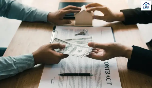 Cash buyer handing the money from the home sale to the seller