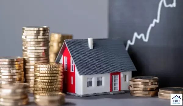 Mini house with coin stacks and rising graph showing home value growth.