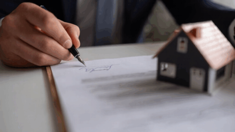 Signing documents for inherited property sale and estate settlement
