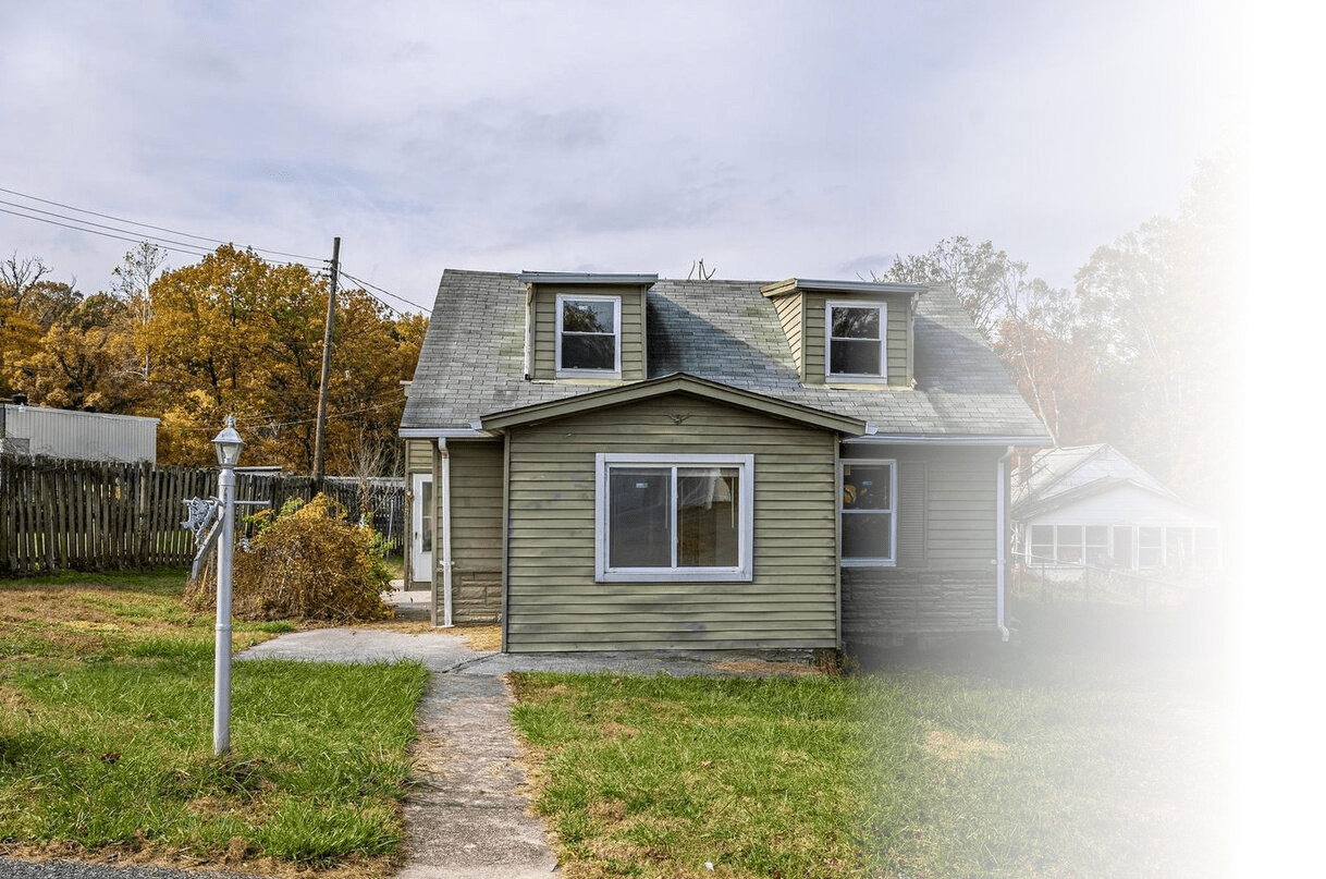 Our Linthicum cape cod home that was frowning before we gave it the love it deserved