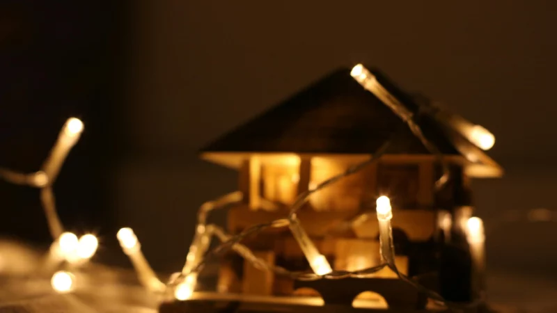 Christmas lights in front of a house