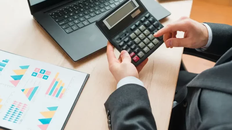 person using a calculator