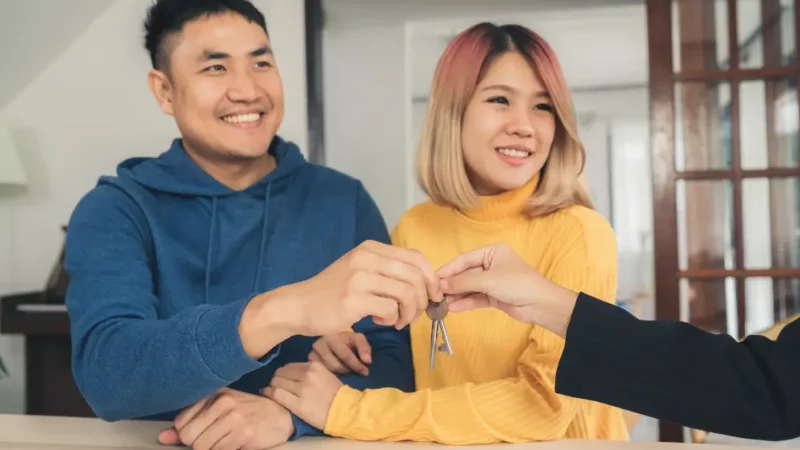 Couple getting handed with Keys