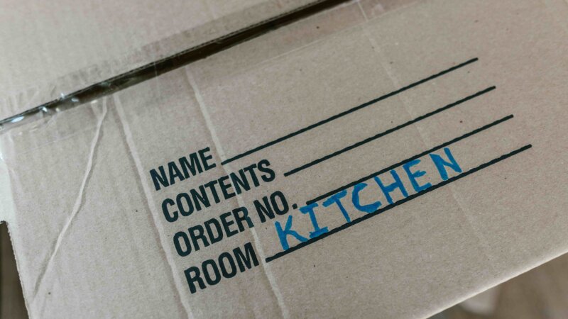 Roommate Moving Out with Kitchen Supplies Boxed