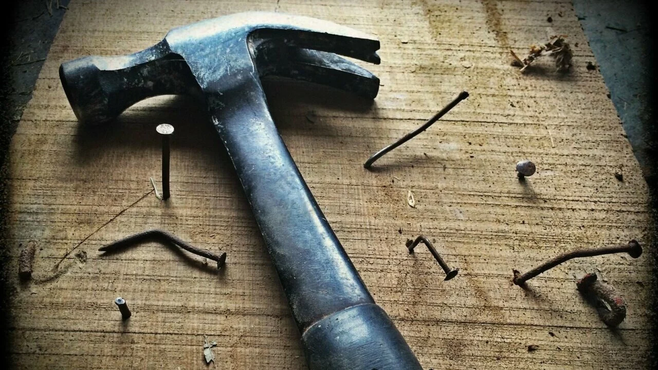 South Carolina home needing major repairs with tools and damaged exterior, representing homeowners looking to sell a house that needs repairs fast.