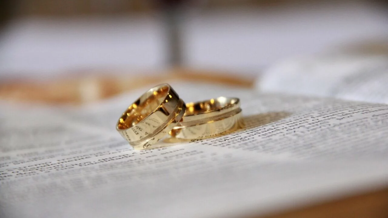 Two wedding rings symbolizing a South Carolina couple preparing to sell their house during divorce with Table Rock Homebuyers.