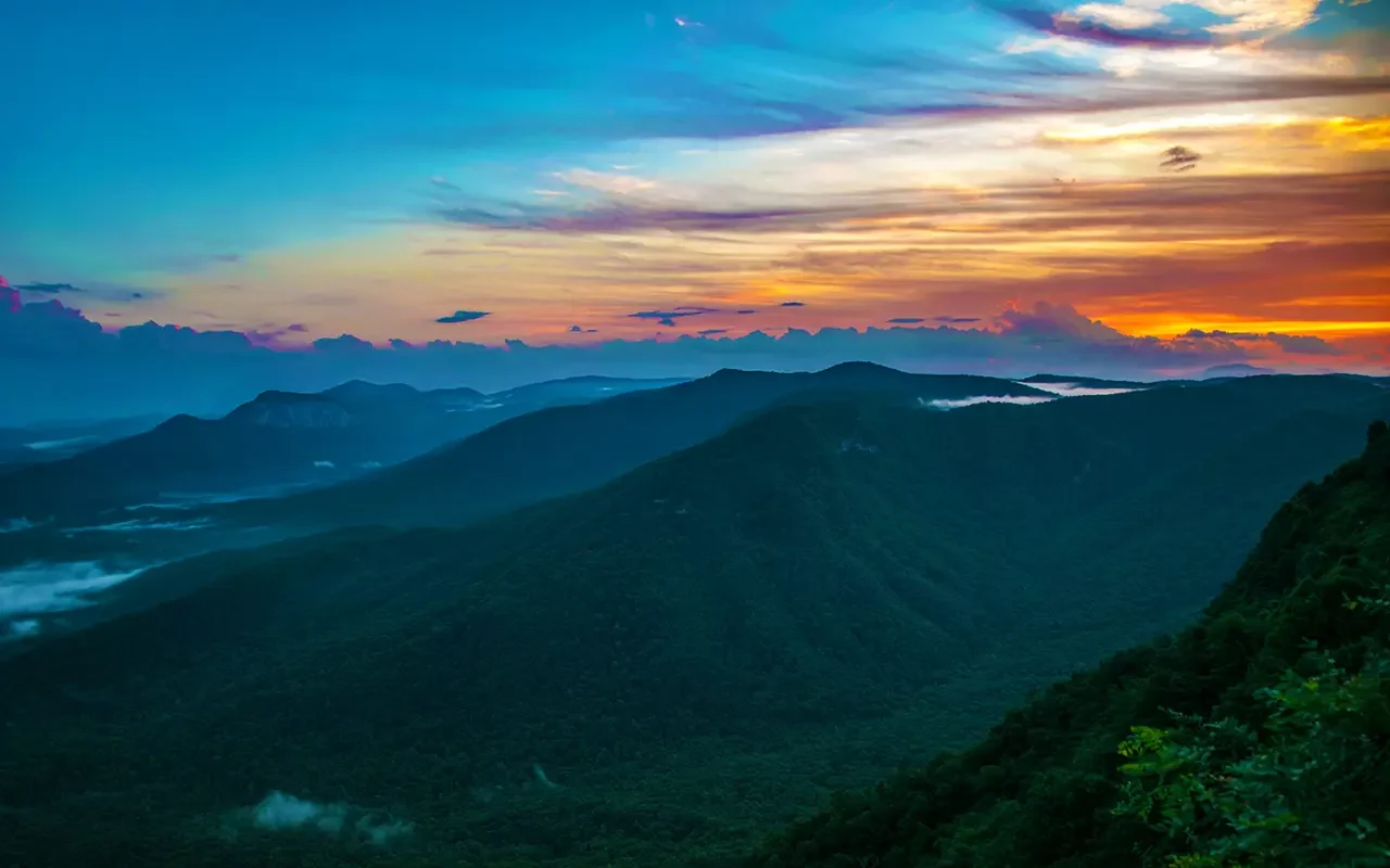 Panoramic view of the South Carolina mountains with sunrise light — representing Table Rock Homebuyers, a trusted local company that buys houses and mobile homes for cash anywhere in South Carolina.