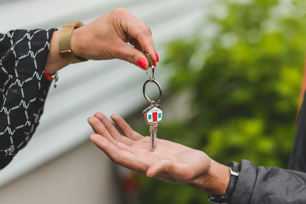 Handing a key over to home owner